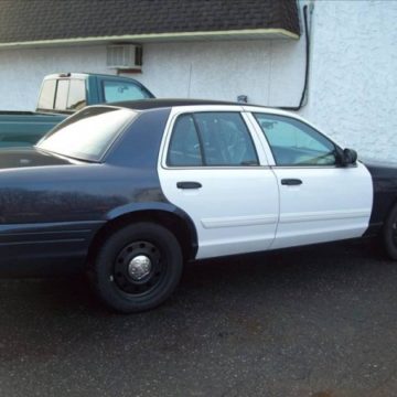 black and white police car before