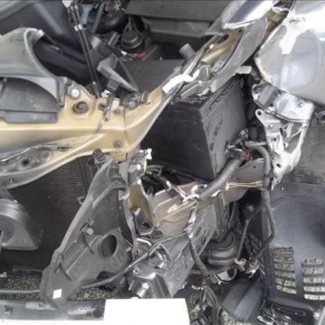 another angle of the Lexus after removing damaged parts of the auto body
